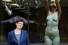 Professor Dora Natella poses with sculpture.